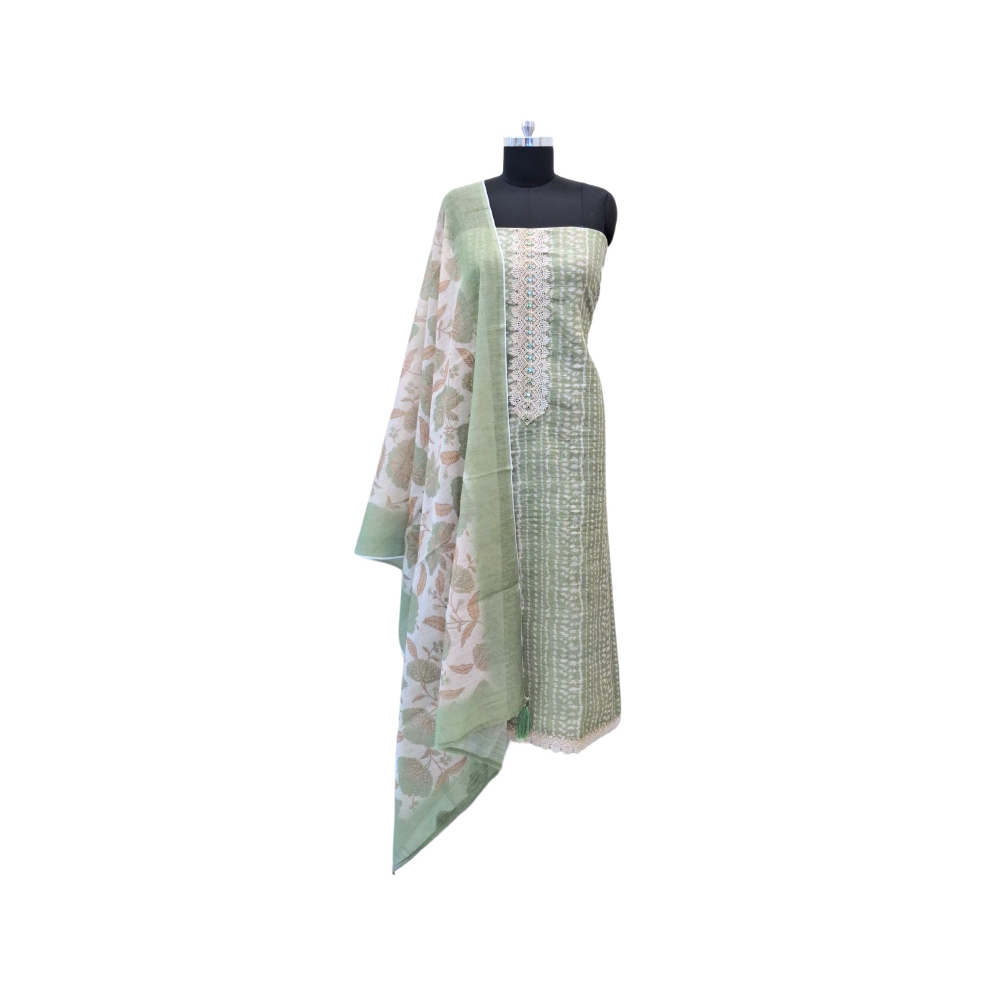 Linen suit with intricate mirror and crochet work, paired with a floral linen dupatta — timeless elegance in suits for women.