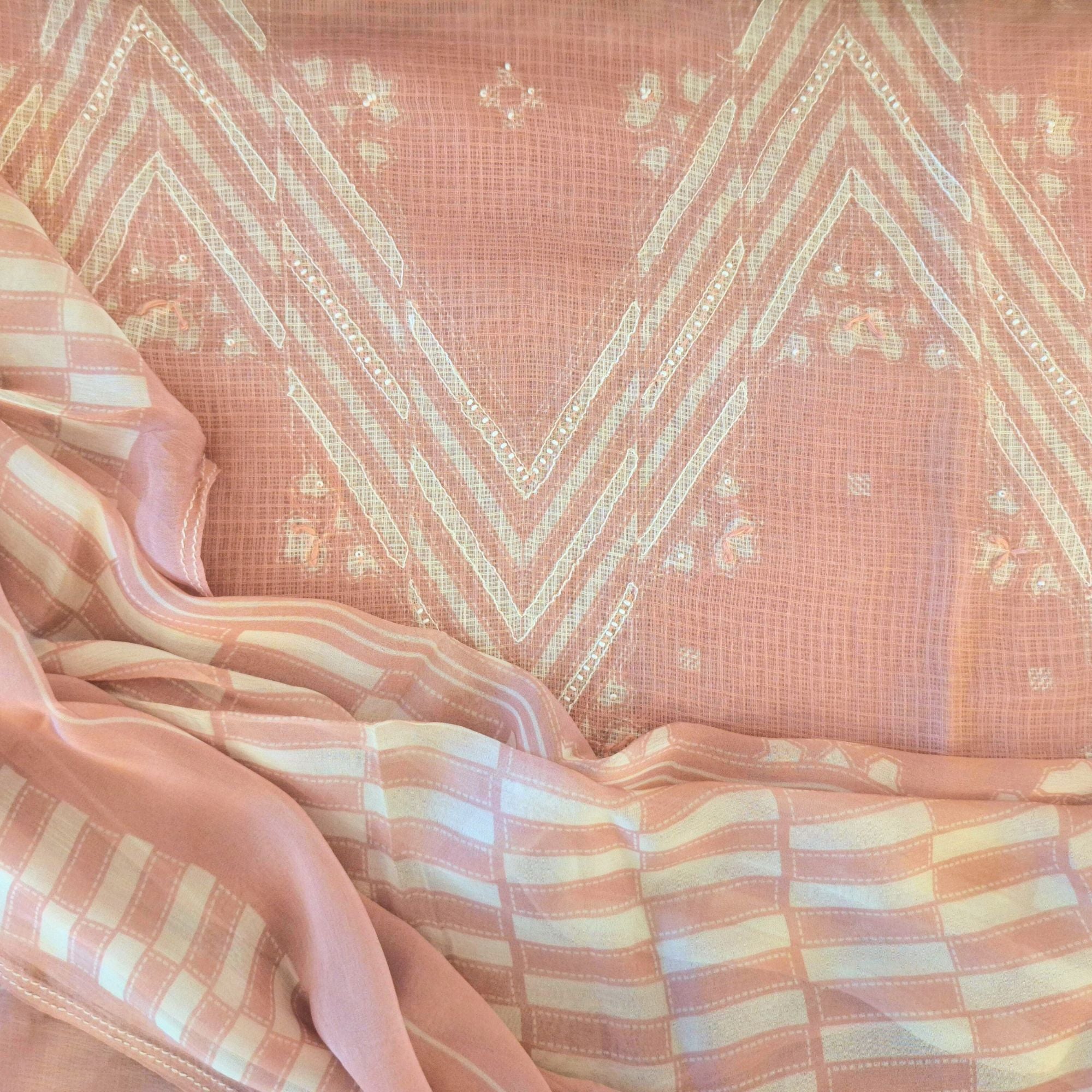 Modern geometry on classic linen, completed with a lightweight chiffon dupatta.