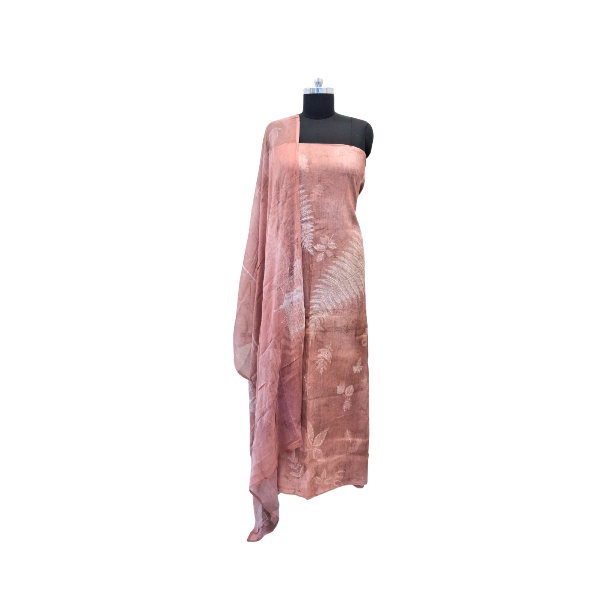 Linen suit with natural patterns paired with a soft chiffon dupatta — effortless charm in casual suits for women.