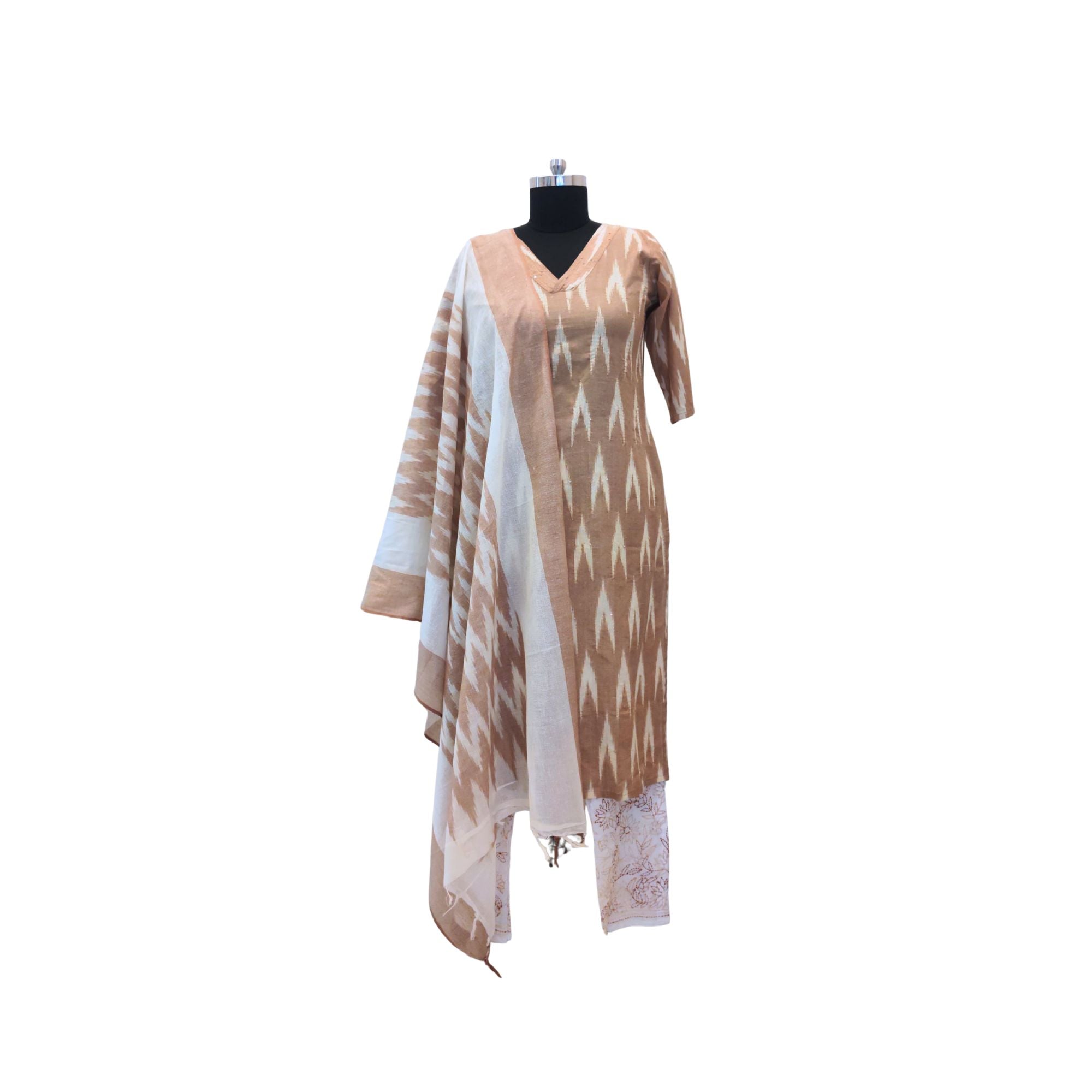 Embrace tradition with this beautifully crafted Ikat print cotton suit.