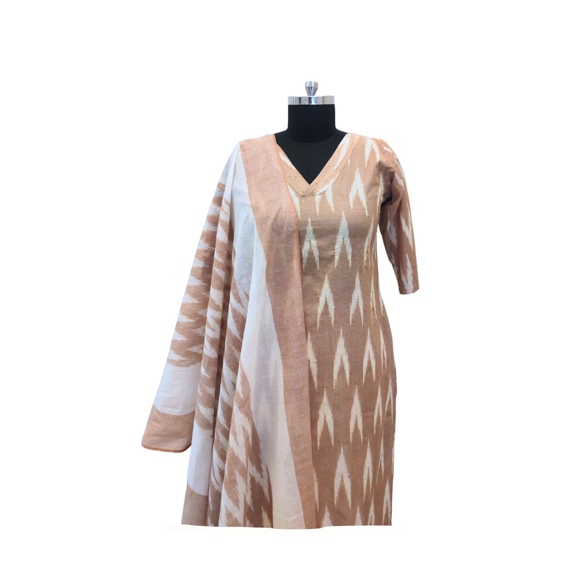 Embrace tradition with this beautifully crafted Ikat print cotton suit.