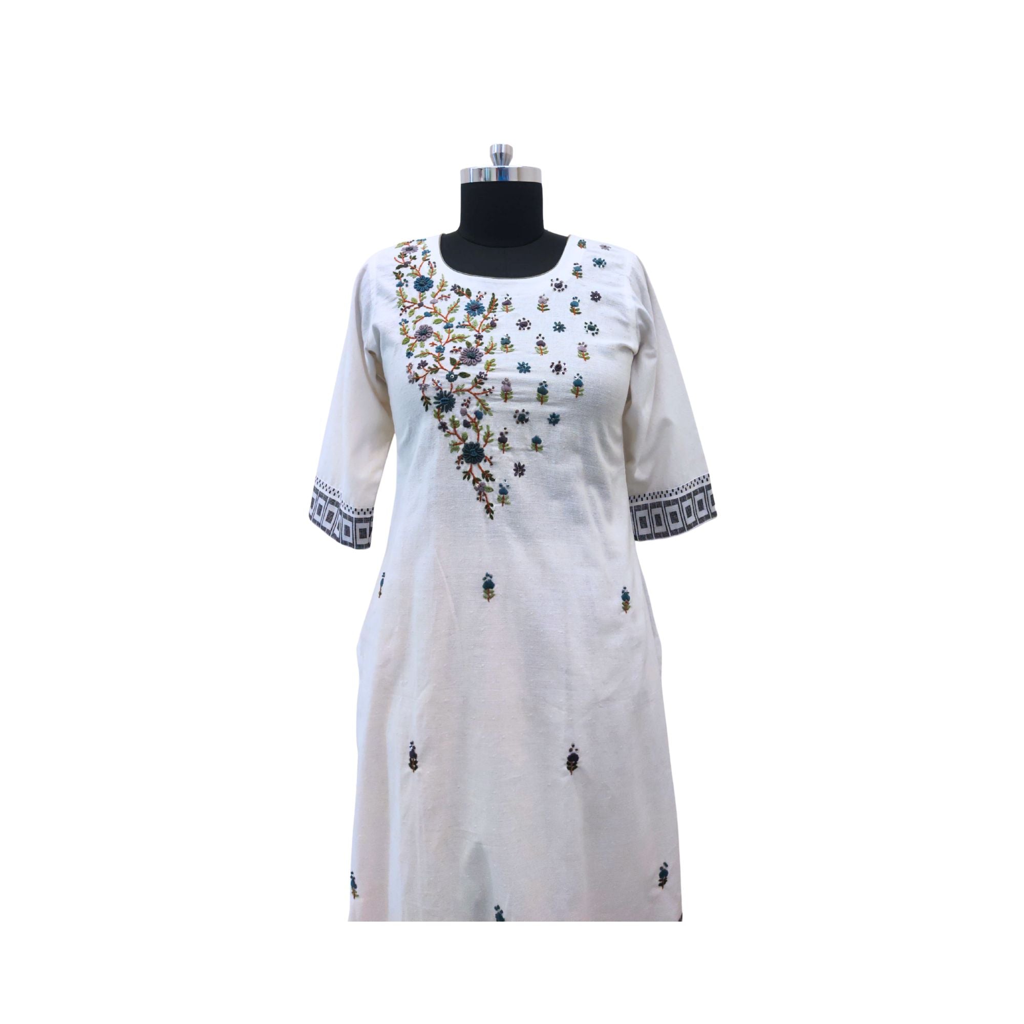 Cotton suit with hand-embroidered yoke — elegant suit for women.