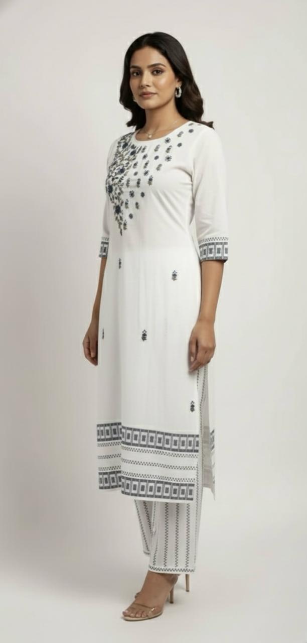 Cotton suit with hand-embroidered yoke — elegant suit for women.